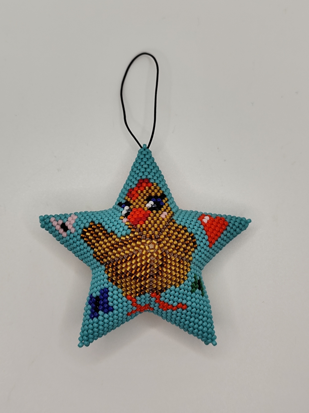 Handmade Turquoise Star Ornament with Beaded Chick Motif